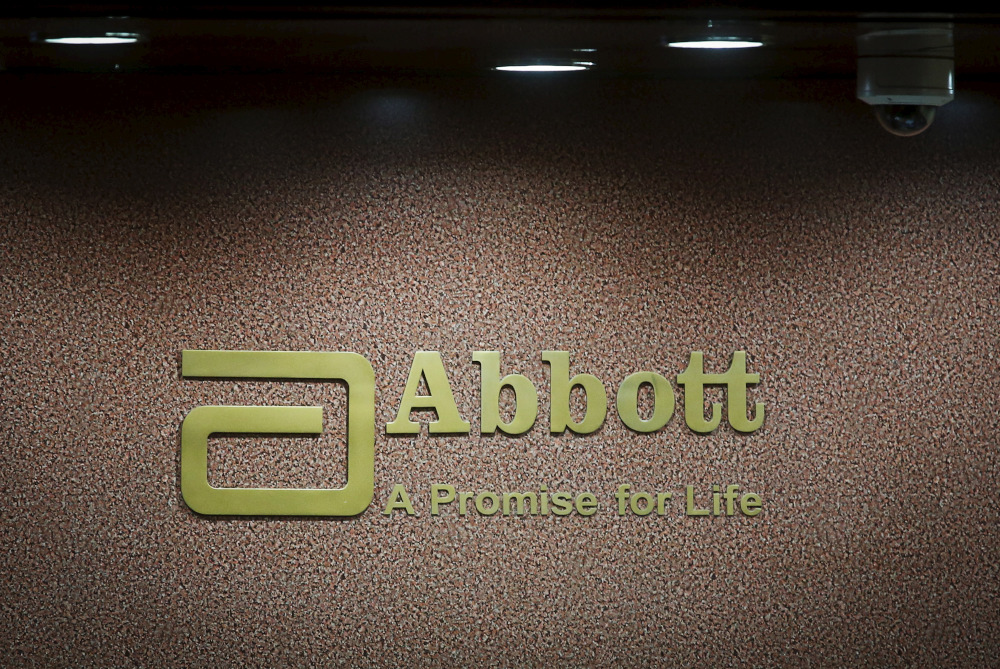 An Abbott company logo is pictured at the reception of its office in Mumbai September 8, 2015. u00e2u20acu201d Reuters pic