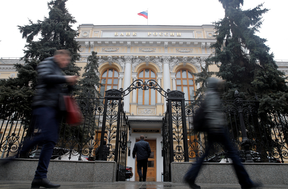 People walk past the Central Bank headquarters in Moscow February 11, 2019. u00e2u20acu201d Reuters pic