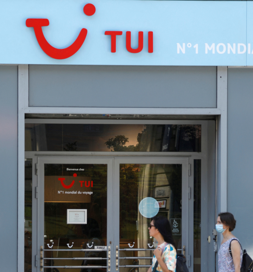 Pedestrians walk past a travel agency of Germany-based travel company TUI in Paris June 23, 2020. u00e2u20acu201d Reuters pic