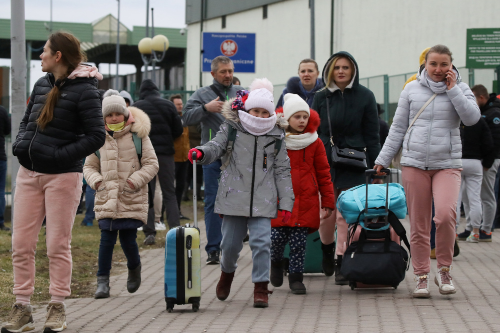People arrive at the border crossing between Poland and Ukraine, after Russia launched a massive military operation against Ukraine, in Medyka, Poland, February 25, 2022. u00e2u20acu201d Reuters pic