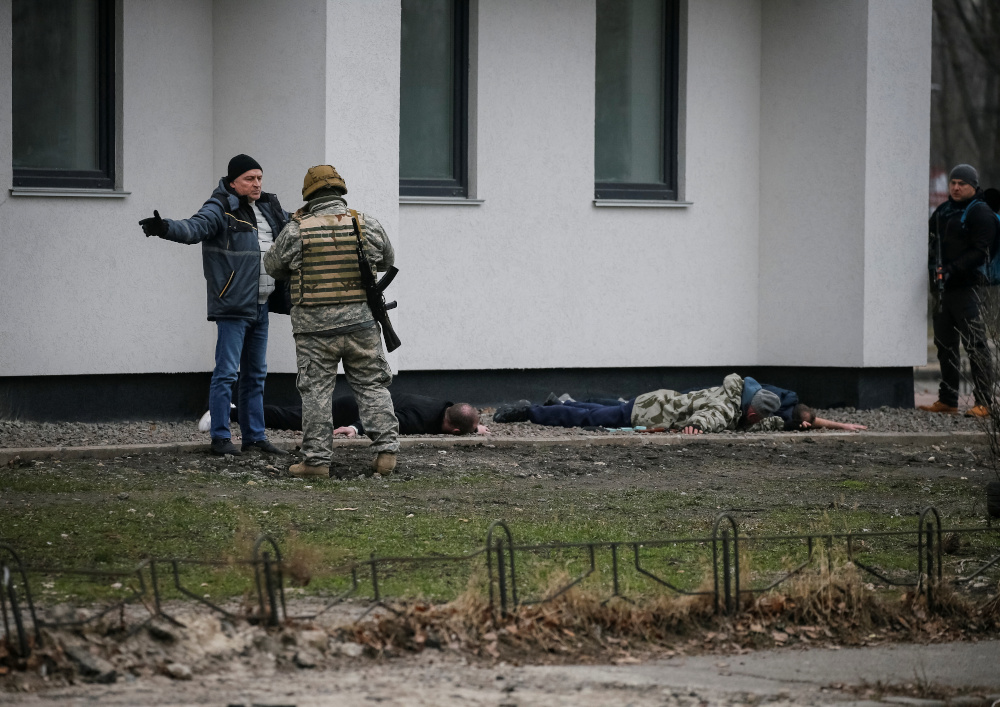 Members of the Ukrainian Territorial Defence Forces patrol Kyiv, Ukraine February 25, 2022. — Reuters pic