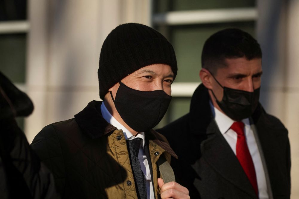 Ex-Goldman Sachs banker Roger Ng exits after the first day of his criminal trial, at the United States Courthouse in Brooklyn, New York, U.S., February 14, 2022. 