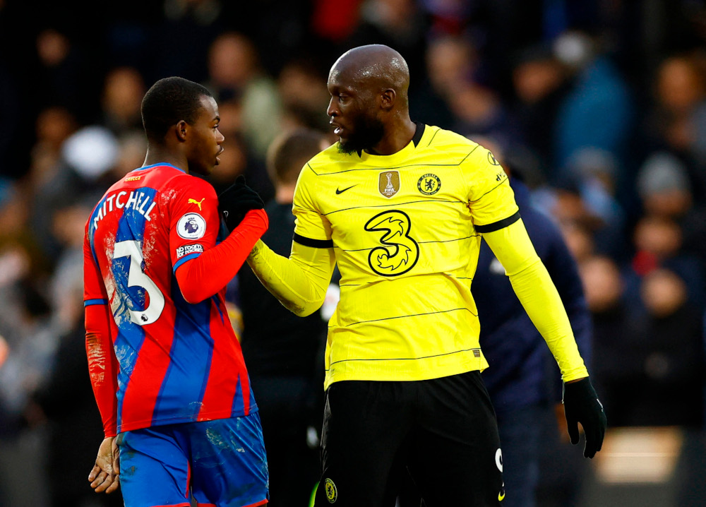 Crystal Palaceu00e2u20acu2122s Tyrick Mitchell with Chelseau00e2u20acu2122s Romelu Lukaku after the match at Selhurst Park, London, Britain, February 19, 2022. u00e2u20acu2022 Action Images pic via Reuters