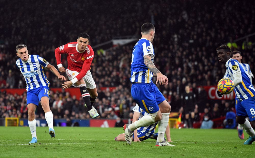 Manchester United's Cristiano Ronaldo celebrates scoring their first goal against Brighton & Hove Albion with teammates at Old Trafford, Manchester February 15, 2022. u00e2u20acu201d Reuters picnnn