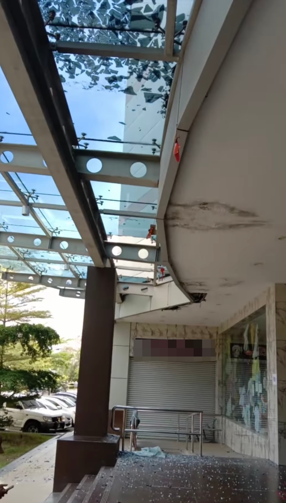 The glass ceiling of a shopping mall in Lutong suddenly collapsed on Sunday. u00e2u20acu2022 Borneo Post Online pic