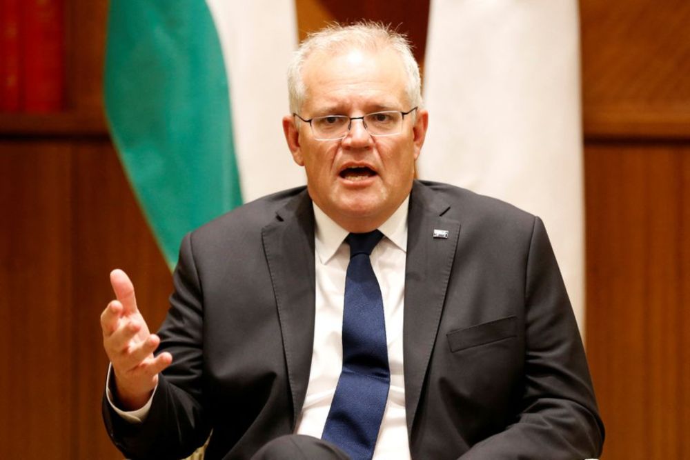 Australian Prime Minister Scott Morrison speaks to the media at Melbourne Commonwealth Parliament Office, in Melbourne, Australia February 11, 2022. u00e2u20acu201d Pool picture via Reuters
