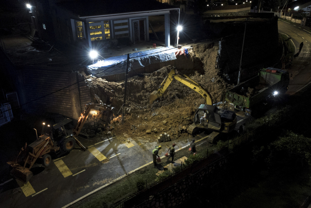 Contractors carry out cleaning work at the site of the landslip in Jalan Limbok, Seremban, February 7, 2022. u00e2u20acu2022 Bernama pic 
