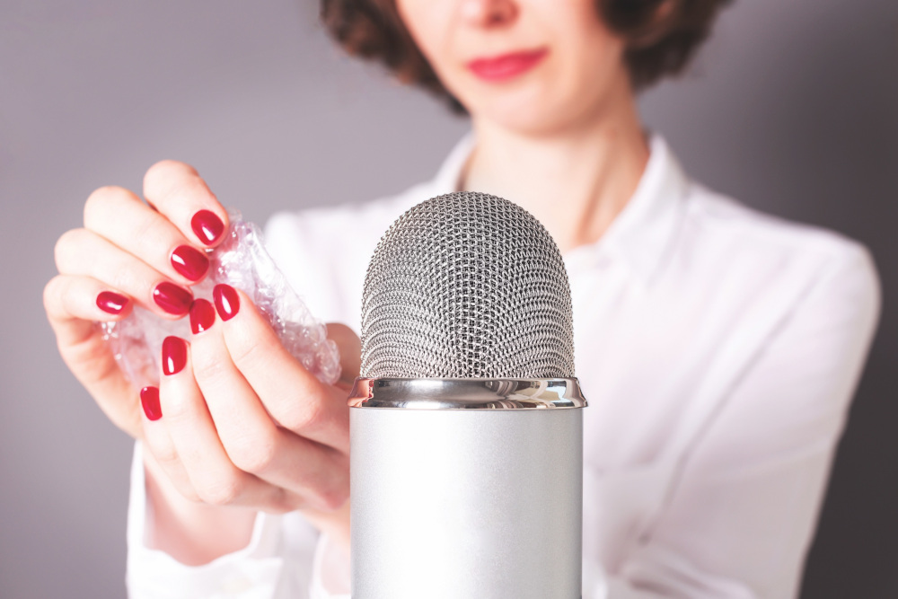 YouTubers film themselves producing soft sounds, but recorded very closely so that the viewer has the impression that they are produced a few centimeters from their ear. u00e2u20acu201d YuliaLisitsa/Shutterstock pic via ETX Studio