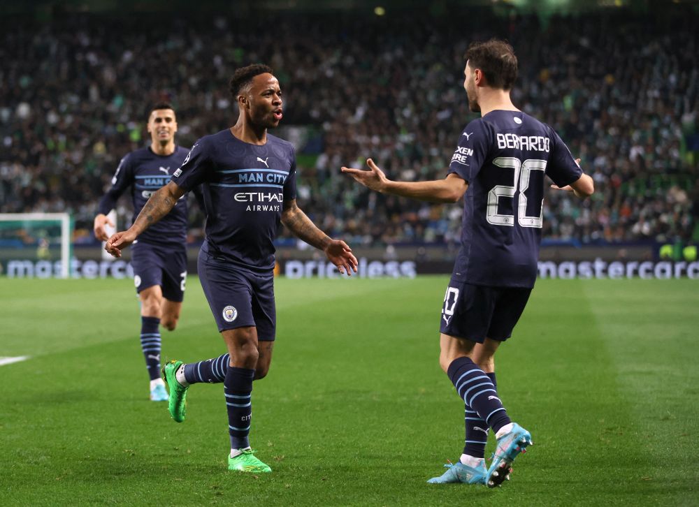 Manchester City's Raheem Sterling celebrates scoring their fifth goal against Sporting Lisbon with Bernardo Silva at Estadio Jose Alvalade, Lisbon February 15, 2022. u00e2u20acu201d Reuters pic