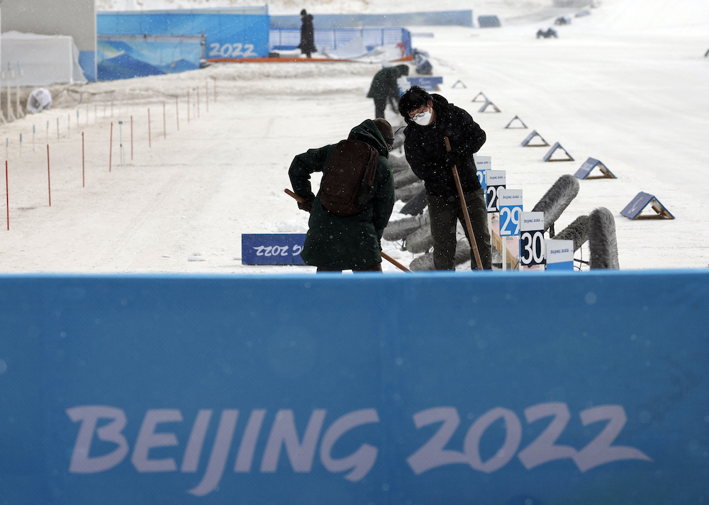 Officials check the conditions at the shooting range of the National Biathlon Centre during bad weather ahead of the Beijing 2022 Winter Paralympic Games, March 4, 2022. u00e2u20acu201d Reuters pic 