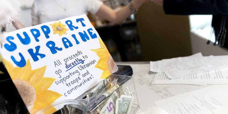 A u00e2u20acu02dcSupport Ukraineu00e2u20acu2122 sign is displayed on the counter at D Light Cafe and Bakery in Washington, DC March 8, 2022. u00e2u20acu201d AFP pic