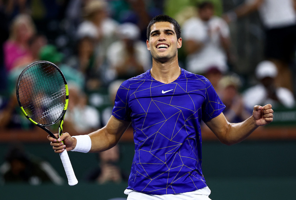 Carlos Alcaraz of Spain celebrates match point against Cameron Norrie of Great Britain in their quarterfinal match of the BNP Paribas Open in Indian Wells, California March 17, 2022. u00e2u20acu201d Clive Brunskill/Getty Images/AFP pic