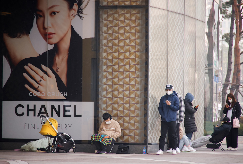 Shoppers line up outside a Chanel store in Seoul, South Korea March 16, 2022. u00e2u20acu201d Reuters pic