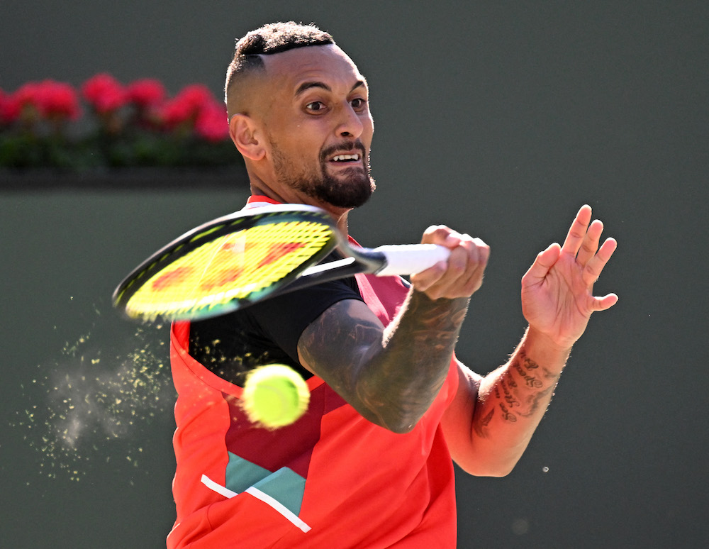 Nick Kyrgios hits a shot in his quarterfinal match against Rafael Nadal (ESP) at the BNP Paribas Open at the Indian Wells Tennis Garden. u00e2u20acu201d  Jayne Kamin-Oncea-USA TODAY Sports pic