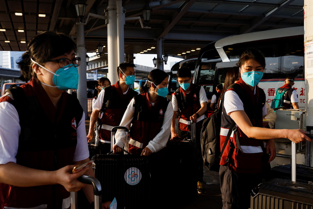 Medical workers from China arrive at Shenzhen Bay Port during the Covid-19 pandemic in Hong Kong, China March 14, 2022. u00e2u20acu201d Reuters pic