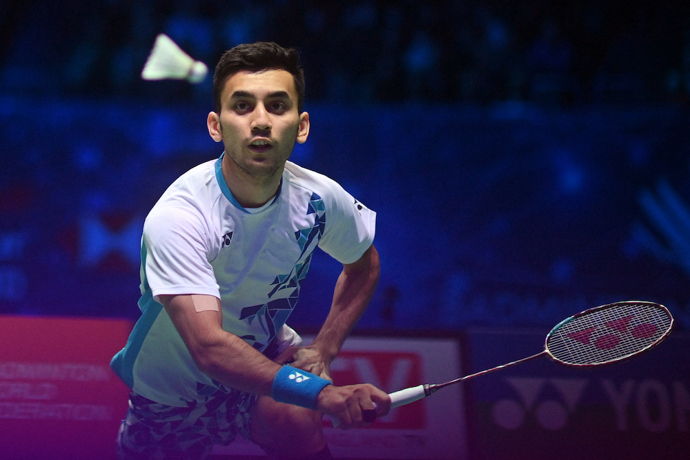 India's Lakshya Sen returns to Malaysia's Lee Zii Jia during their men's single's semi-final at the All England Open Badminton Championship at the Utilita Arena in Birmingham March 19, 2022. u00e2u20acu201d AFP pic
