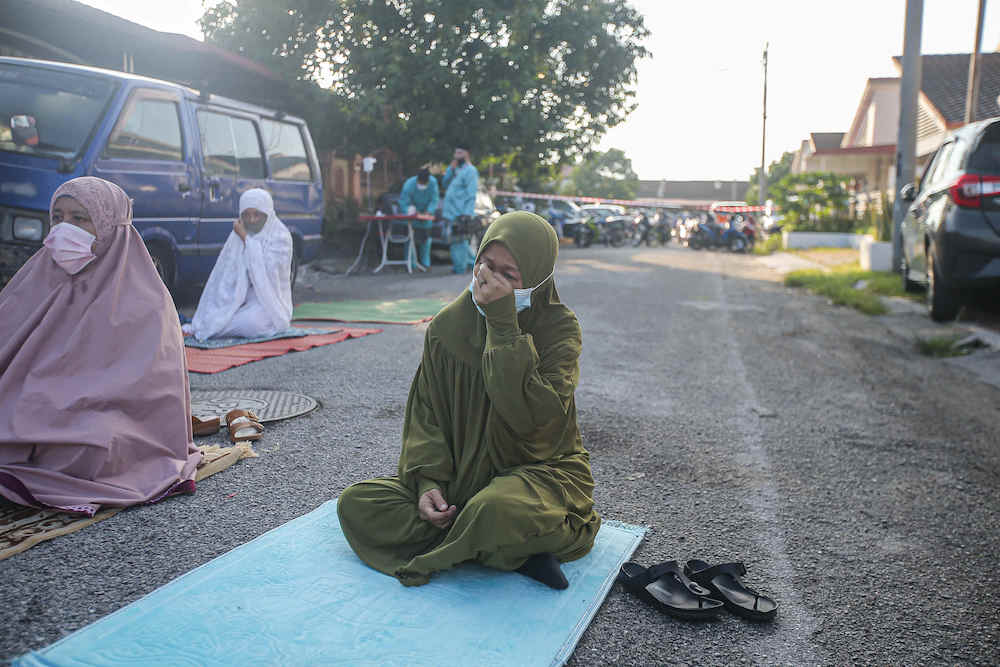 Muslims still found ways to pray when they couldn't congregate in mosques. — Picture by Farhan Najib