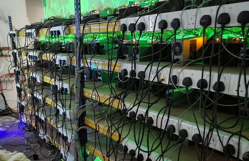 A police photo showing the rows of the cryptocurrency mining machines that were found inside the premises. u00e2u20acu201d Picture via Borneo Post 