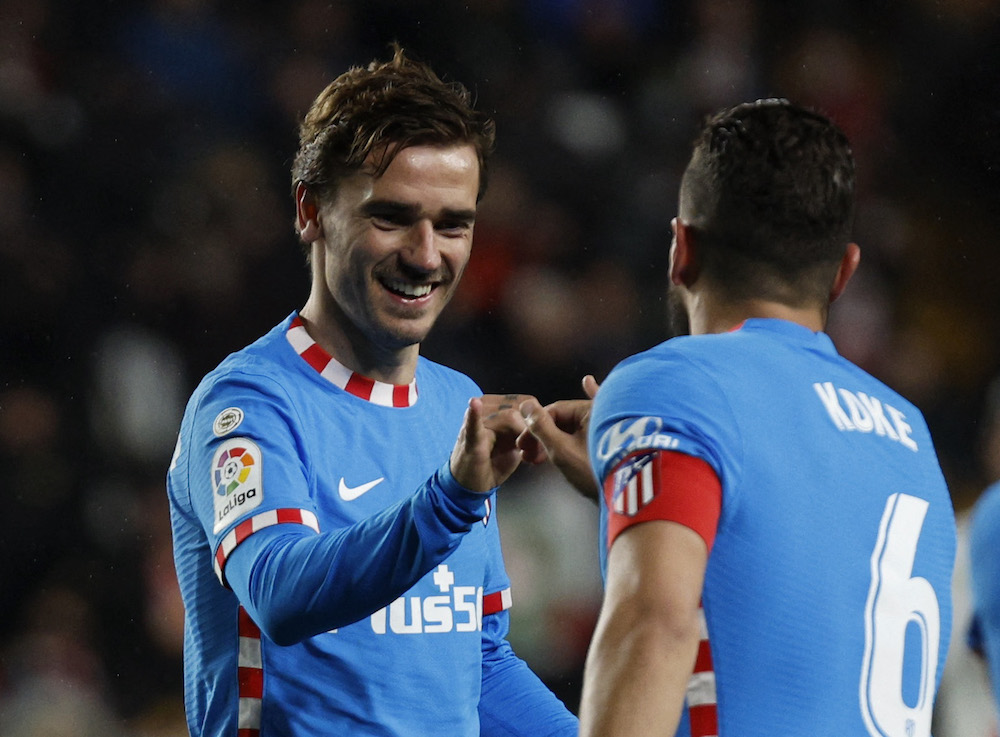 Atletico Madrid's Koke celebrates scoring their first goal against Rayo Vallecano with Antoine Griezmann, Madrid March 29, 2022. u00e2u20acu201d Reuters pic 
