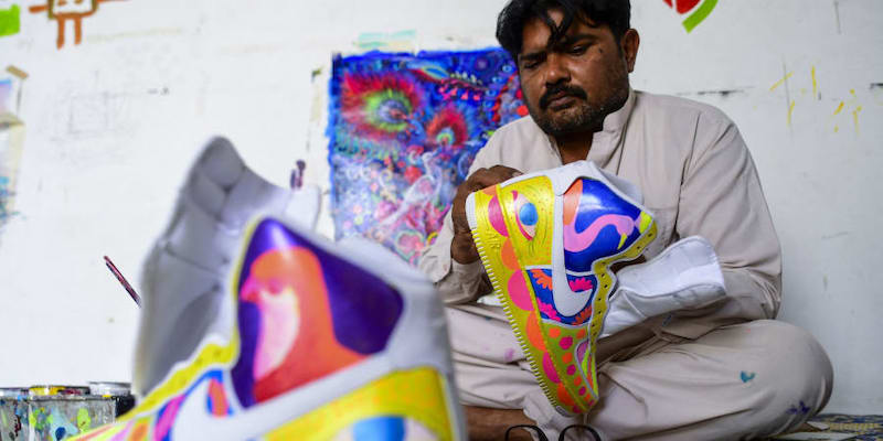 Haider Ali has transposed Pakistan's renowned 'truck art' onto sneakers. u00e2u20acu201d AFP pic