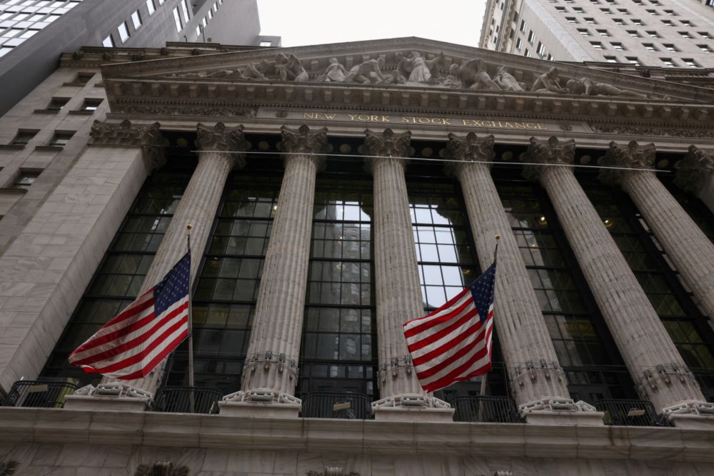 Flags are seen outside the New York Stock Exchange (NYSE) in New York City, where markets roiled after Russia continues to attack Ukraine, in New York, US, February 24, 2022. u00e2u20acu201d Reuters pic