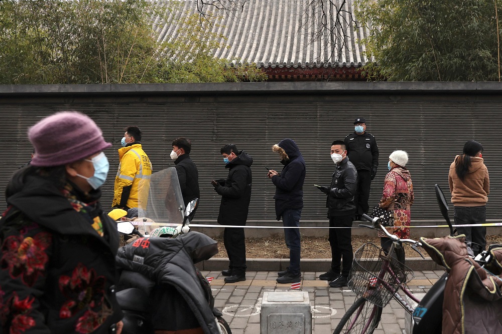 Residents line up for nucleic acid testing, following the coronavirus disease outbreak, in Beijing March 18, 2022. u00e2u20acu201d Reuters pic