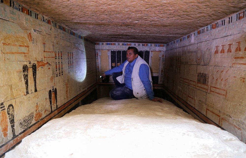 An Egyptian archaeologist speaks inside the tomb of a woman named Petty who was responsible for the King’s beautification and the priest of Hathor, at a recently discovered tomb at the Saqqara area, in Giza March 19, 2022. — Reuters pic 