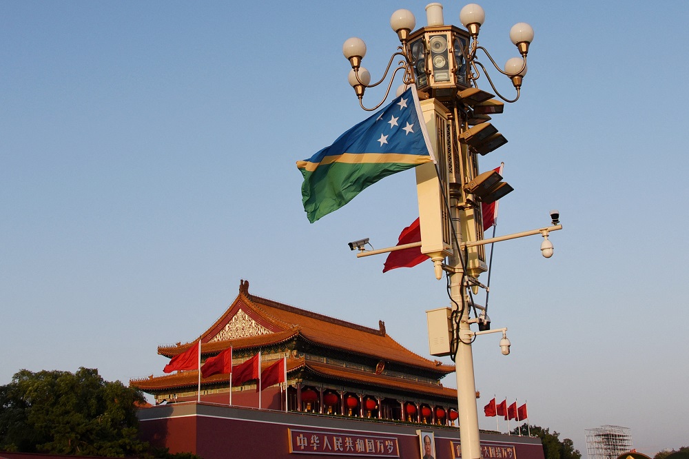National flags of Solomon Islands and China flutter at the Tiananmen Square in Beijing October 7, 2019. u00e2u20acu201d Reuters/Stringer pic