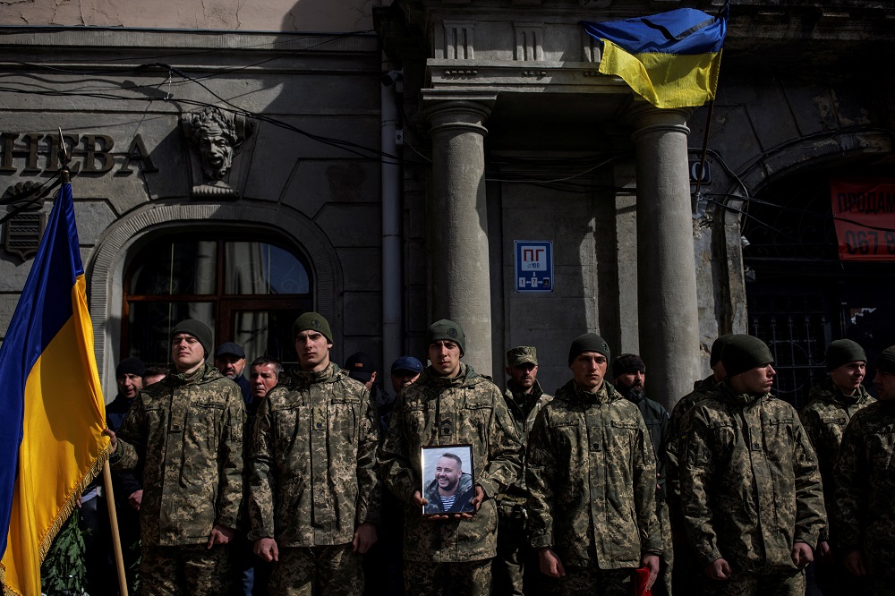 Soldiers stand guard before a funeral ceremony at Saints Peter and Paul Garrison Church in Lviv, Ukraine March 27, 2022. u00e2u20acu201d Reuters pic