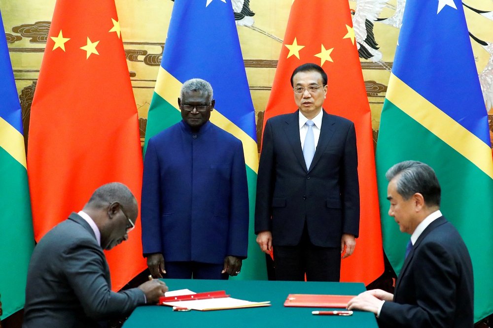 (From left) Solomon Islands Prime Minister Manasseh Sogavare, Solomon Islands Foreign Minister Jeremiah Manele, Chinese Premier Li Keqiang and Chinese State Councillor and Foreign Minister Wang Yi in Beijing October 9, 2019. u00e2u20acu201d Reuters pic