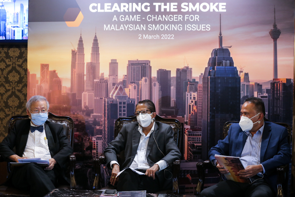 (From left) Federation of Private Medical Practitioner's Association Malaysia president Dr Steven Chow, DARE Managing Director Pankaj Kumar and medical practitioner Dr Arifin Fii speak during the DARE media roundtable in Bangsar March 2, 2022. u00e2u20acu201d Picture