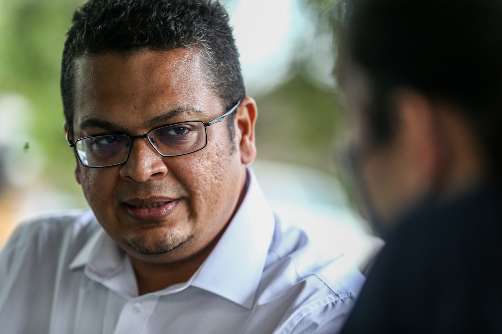 Parti Pejuang Tanah Air candidate for Rengit Nizam Bashir Abdul Kariem Bashir speak to Malay Mail in Rengit, Batu Pahat February 28, 2022. — Picture by Hari Anggara