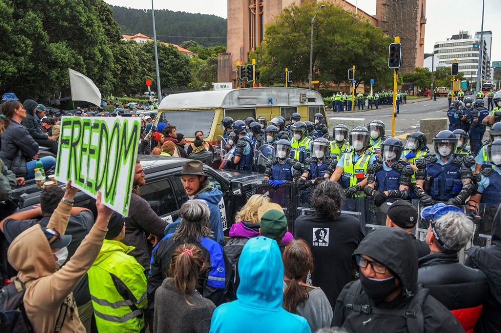 Police stand guard as protesters against Covid-19 vaccine mandates and restrictions gather near parliament grounds in Wellington March 2, 2022. u00e2u20acu201d AFP pic