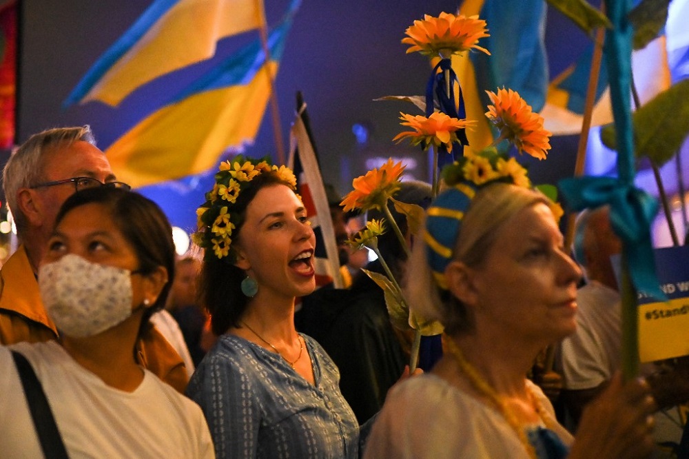 Members of the Australian-Ukrainian community and supporters participate in a protest against Russiau00e2u20acu2122s invasion of Ukraine, at the Sydney Opera House in Sydney March 1, 2022. u00e2u20acu201d AFP pic