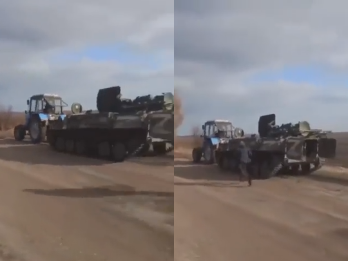 A video showing a Ukrainian farmer towing a Russian tank with his tractor has been circulating online. u00e2u20acu201d Screen capture via Twitter/Arslon Xudosi