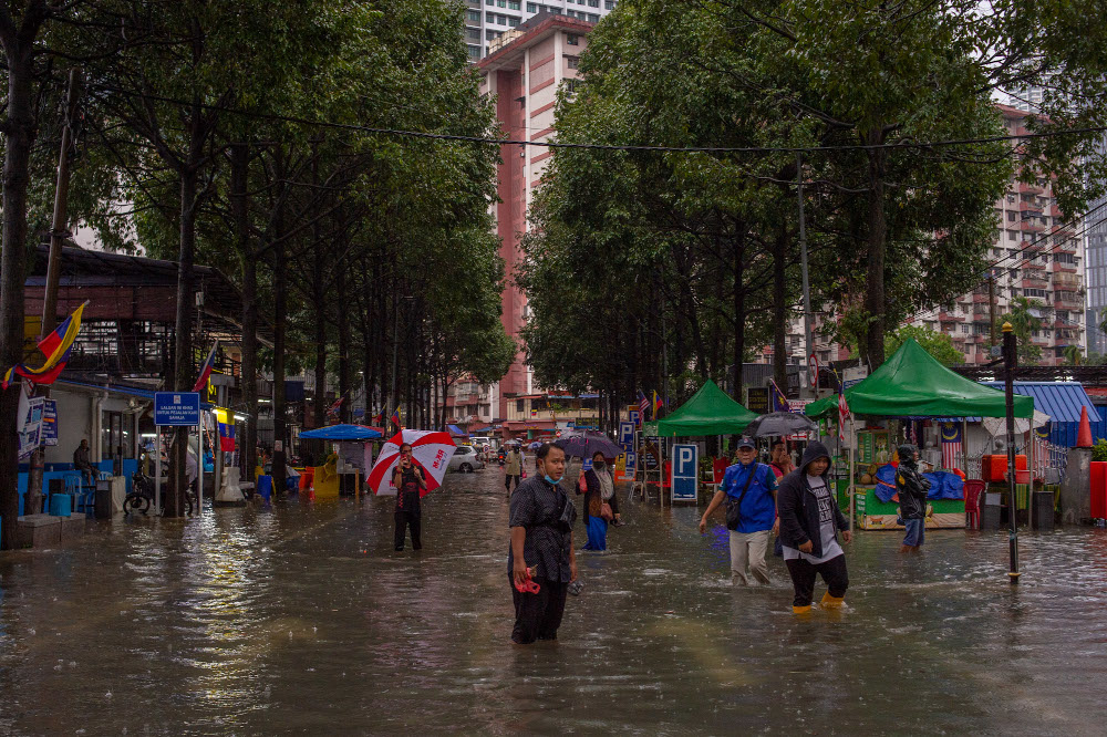 Kampung Baru is flooded after heavy rain in Kuala Lumpur March 7, 2022. u00e2u20acu201d Picture by Shafwan Zaidon