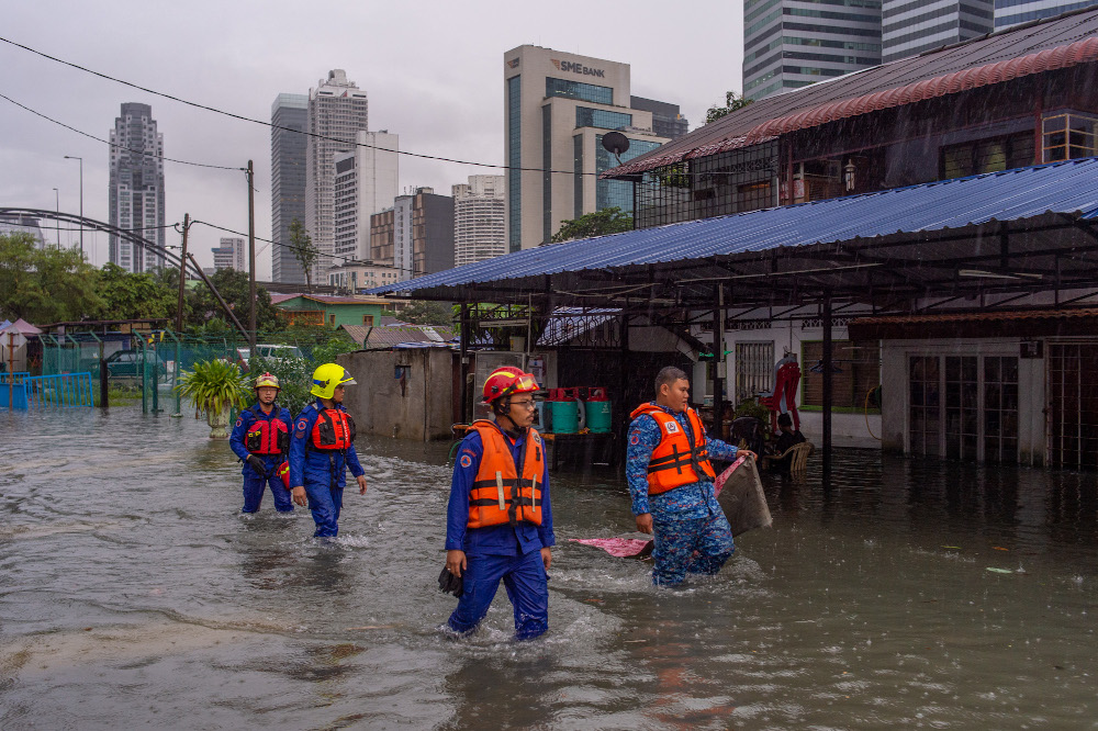 Kampung Baru is flooded after heavy rain in Kuala Lumpur March 7, 2022. u00e2u20acu201d Picture by Shafwan Zaidon