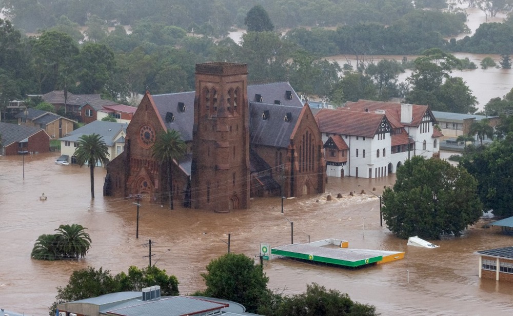 An aerial view of a flooded church and other buildings in the northern New South Wales city of Lismore from an Australian Army helicopter taking part in Operation Flood Assist February 28, 2022. u00e2u20acu201d Picture by Australian Defence Force via AFP