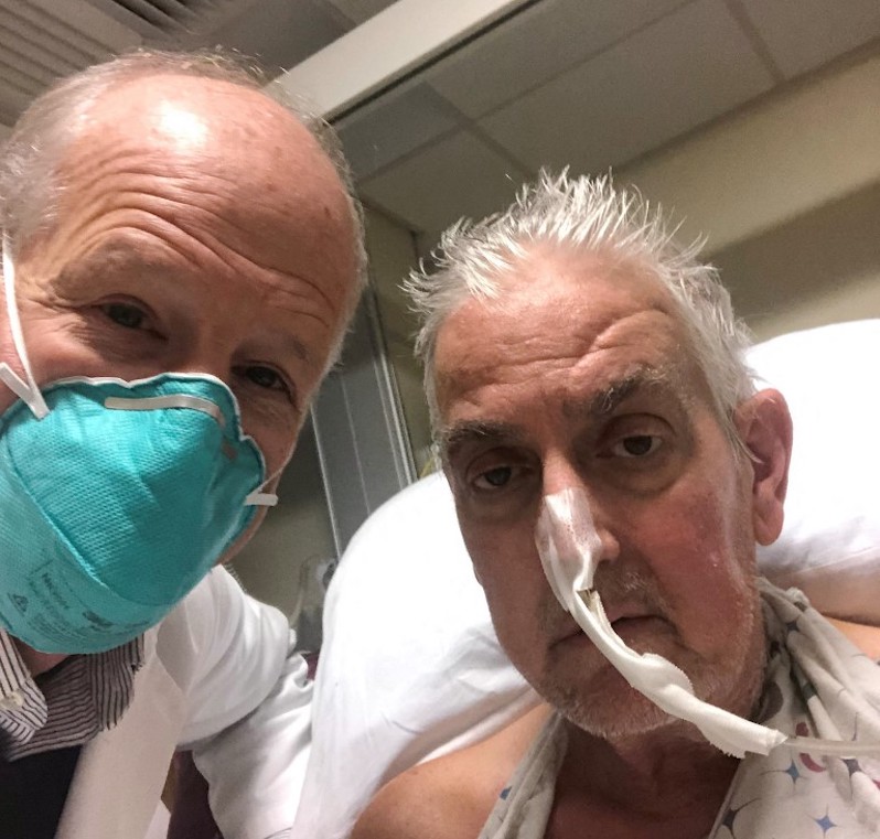 Dr. Bartley Griffith (left) with patient David Bennett, Sr.,who received a heart implant from a genetically modified pig, in Baltimore, Maryland, in January 2022. u00e2u20acu201d AFP pic