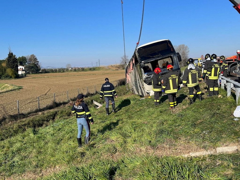 Firefighters work at the scene of an accident where a bus crashed while carrying Ukrainian citizens, near Cesena, Italy, March 13, 2022.u00e2u20acu201d  Polizia di Stato handout via Reuters  