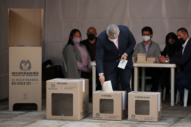 Colombian President Ivan Duque casts his vote during congressional and presidential coalitions elections that will determine which candidates will head to the first round of presidential voting, in Bogota, Colombia March 13, 2022. u00e2u20acu201d Reuters picn n