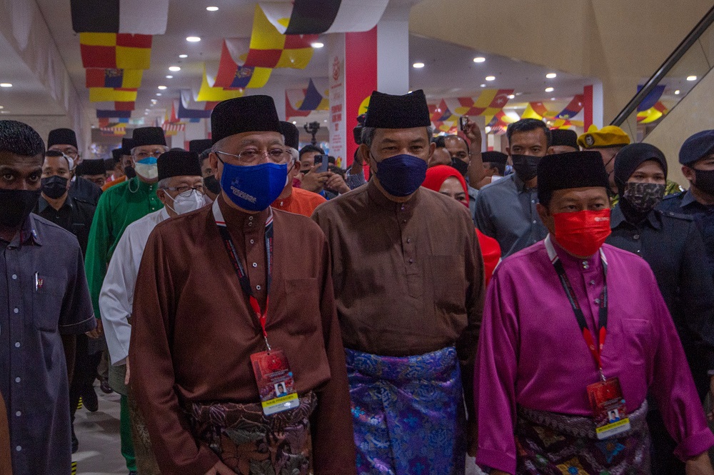 Umno vice president Datuk Seri Ismail Sabri (left) and Umno deputy president Datuk Seri Mohamad Hasan (centre) arrive for the the general assembly of the party's Women, Youth and Puteri Wing in Kuala Lumpur March 16, 2022. u00e2u20acu2022 Picture by Shafwan Zaidon