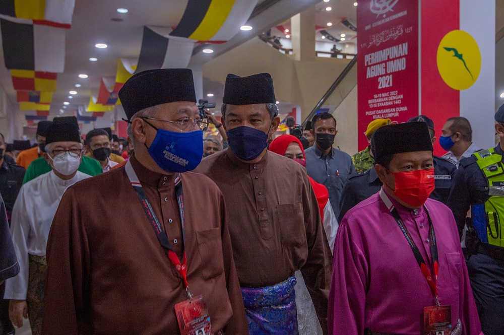 Umno vice president Datuk Seri Ismail Sabri (left) and Umno deputy president Datuk Seri Mohamad Hasan (centre) arrive for the the general assembly of the party's Women, Youth and Puteri Wing in Kuala Lumpur March 16, 2022. u00e2u20acu2022 Picture by Shafwan Zaidon