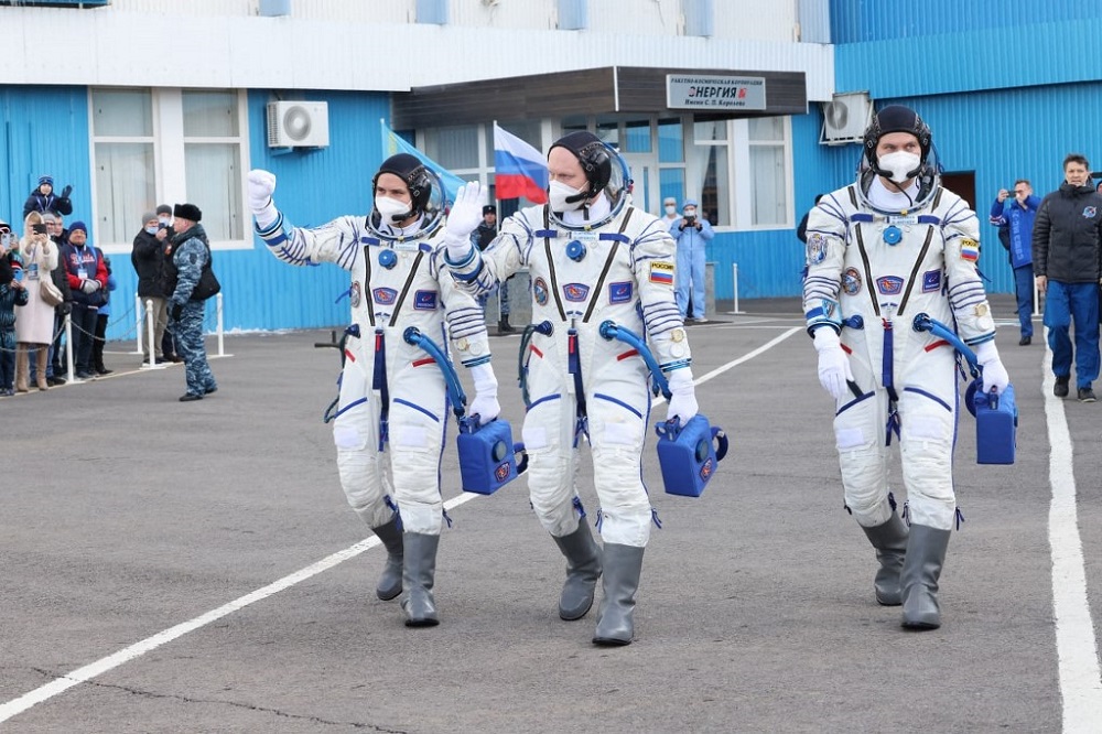 The International Space Station crew of Russian cosmonauts walk before boarding the Soyuz MS-21 spacecraft prior to the launch at the Russian-leased Baikonur cosmodrome in Kazakhstan March 18, 2022. u00e2u20acu201d Russian Space Agency Roscosmos handout via AFP 