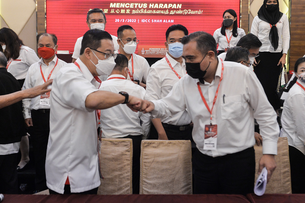 (From left) DAP national chairman Lim Guan Eng and DAP secretary-general Anthony Loke Siew Fook are seen during DAPu00e2u20acu2122s 17th Party Congress in IDCC on March 20, 2022. u00e2u20acu201d Picture by Miera Zulyana