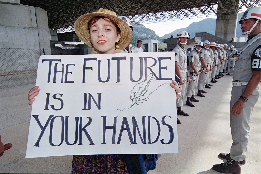 An Australian NGO member demonstrates in downtown Rio de Janeiro on June 9, 1992 as environmental organisations stage. u00e2u20acu201d AFP pic
