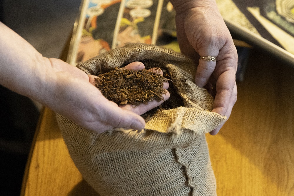 Cindy Armstrong is pictured with a bag containing the composted remains of her son Andrew Armstrong at her home in Covington, Washington. u00e2u20acu201d AFP pic