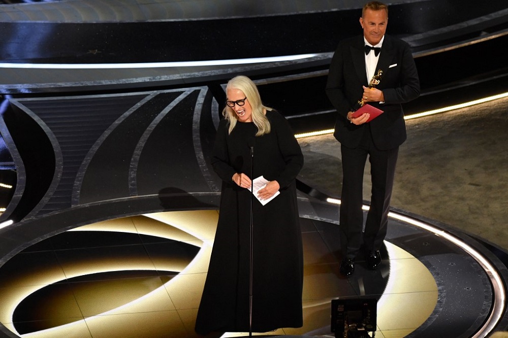 New Zealand director Jane Campion (left) accepts from US actor Kevin Costner the award for Best Director for u00e2u20acu02dcThe Power of the Dogu00e2u20acu2122 onstage during the 94th Oscars at the Dolby Theatre in Hollywood March 27, 2022. u00e2u20acu201d AFP pic