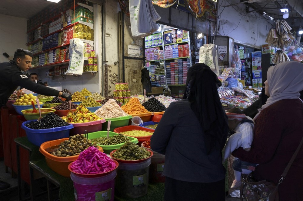 Palestinians shop at Al-Zawya old market in Gaza City in preparation for the upcoming Muslim holy fasting month of Ramadan March 29, 2022. u00e2u20acu201d AFP pic