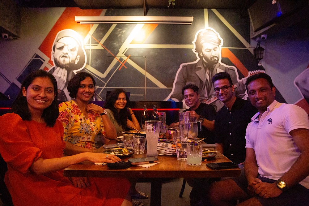 From left: Suma Manohar, Renu Sharat, Shilpa Sardesai, Aditya Sardesai, Sharat Menon and Girish Sathyanarayana having drinks at a bar in Clarke Quay March 29, 2022. — TODAY pic